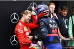 Sebastian Vettel (Ferrari) und Daniil Kwjat (Toro Rosso) 