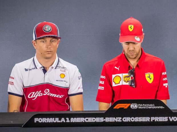 Titel-Bild zur News: Kimi Räikkönen, Sebastian Vettel