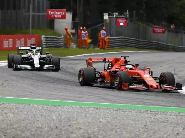 Titel-Bild zur News: Sebastian Vettel, Lewis Hamilton