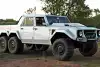 Bild zum Inhalt: Lamborghini LM002 6x6 Rendering: Offroad-Wahnsinn für alle