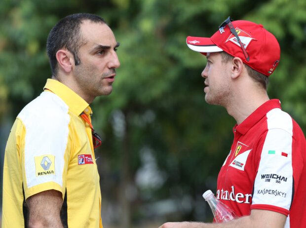 Titel-Bild zur News: Cyril Abiteboul, Sebastian Vettel