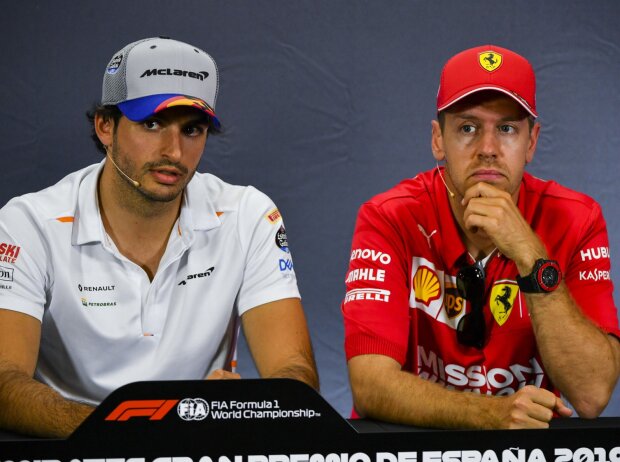 Titel-Bild zur News: Carlos Sainz, Sebastian Vettel