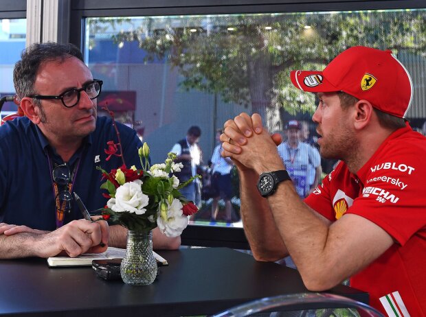 Titel-Bild zur News: Roberto Chinchero und Sebastian Vettel