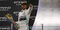 Lewis Hamilton, mit Pokal