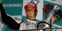 Bild zum Inhalt: Der legendäre Malaysia-GP 2009: Button gewinnt stehend, Räikkönen isst Eis
