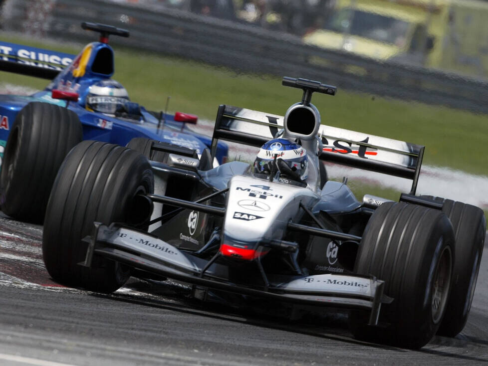 Kimi Räikkönen vor Nick Heidfeld
