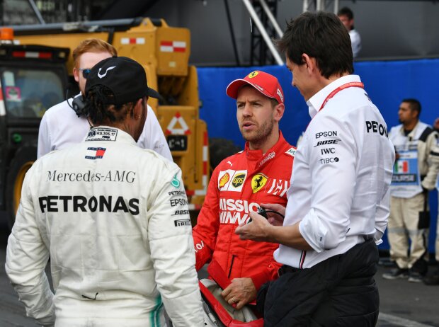 Toto Wolff, Sebastian Vettel, Lewis Hamilton Toto Wolff, Sebastian Vettel, Lewis Hamilton