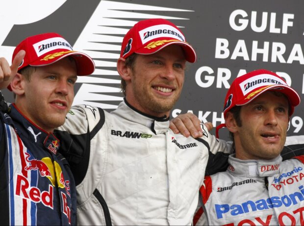 Sebastian Vettel, Jenson Button, Jarno Trulli Sebastian Vettel, Jenson Button, Jarno Trulli