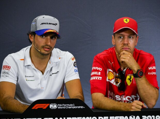 Titel-Bild zur News: Carlos Sainz, Sebastian Vettel