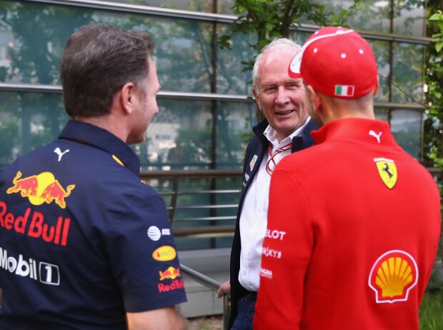 Titel-Bild zur News: Christian Horner, Helmut Marko, Sebastian Vettel
