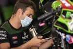 Kawasaki-Mechaniker mit Mundschutz