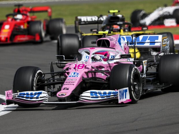 Lance Stroll, Esteban Ocon, Sebastian Vettel Lance Stroll, Esteban Ocon, Sebastian Vettel