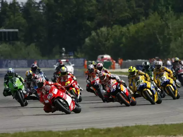 Loris Capirossi, Nicky Hayden, Valentino Rossi Titel-Bild zur News: Loris Capirossi, Nicky Hayden, Valentino Rossi