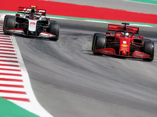 Titel-Bild zur News: Sebastian Vettel, Kevin Magnussen