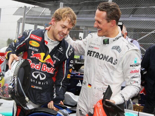 Michael Schumacher, Sebastian Vettel Michael Schumacher, Sebastian Vettel