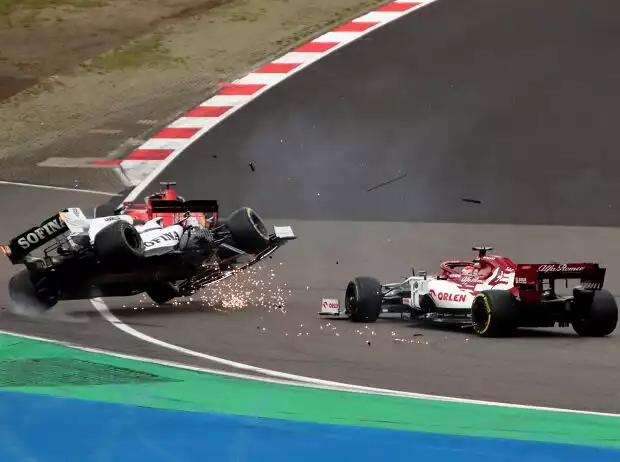 Titel-Bild zur News: George Russell, Kimi Räikkönen