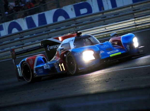Jenson Button, Michail Aljoschin, Witali Petrow Jenson Button, Michail Aljoschin, Witali Petrow