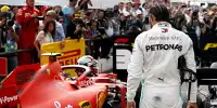 Lewis Hamilton inspiziert den Ferrari von Charles Leclerc