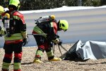 Feuerwehr bei gestürztem MotoE-Motorrad