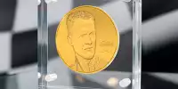 Bild zum Inhalt: Auktion von Schumacher-Goldmünze bringt mehr als 100.000 Euro ein