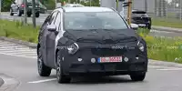 Bild zum Inhalt: Kia Sportage (2022): Erlkönig gewährt Blick auf die Scheinwerfer