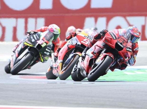 Francesco Bagnaia, Marc Marquez, Aleix Espargaro Francesco Bagnaia, Marc Marquez, Aleix Espargaro