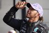 Bild zum Inhalt: Lewis Hamilton: Wie er auf Teamfotos den Ernst der Lage erkannte