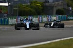 Esteban Ocon (Alpine) und Sebastian Vettel (Aston Martin) 