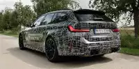Bild zum Inhalt: BMW M3 Touring (2022) zeigt sich getarnt in offiziellem Teaser