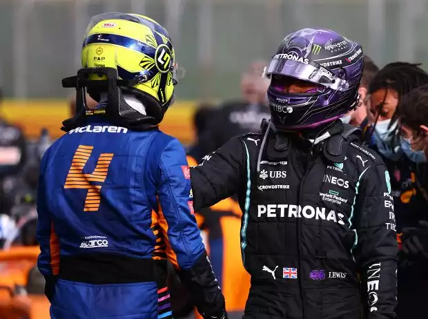 Titel-Bild zur News: Lando Norris (McLaren) und Lewis Hamilton (Mercedes)