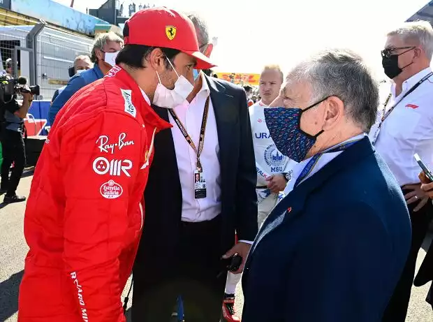 Carlos Sainz, Stefano Domenicali, Jean Todt Titel-Bild zur News: Carlos Sainz, Stefano Domenicali, Jean Todt