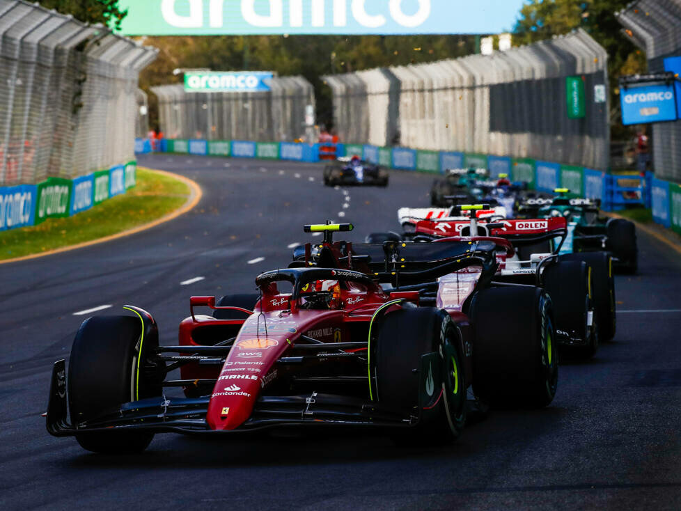 Guanyu Zhou, Carlos Sainz, Kevin Magnussen