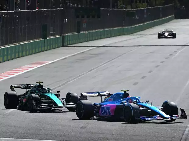 Titel-Bild zur News: Esteban Ocon (Alpine) vor Sebastian Vettel (Aston Martin) im Formel-1-Rennen von Baku 2022