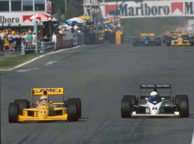 Nelson Piquet (Lotus) und Martin Brundle (Brabham) beim Grand Prix von Portugal in Estoril 1989