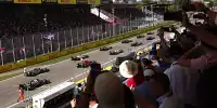 Fans verfolgen den Start zum Italien-Grand-Prix 2022 in Monza
