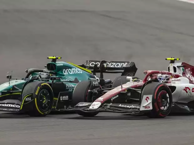 Titel-Bild zur News: Guanyu Zhou, Sebastian Vettel