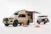 Bild zum Inhalt: Toyota Hilux Camper hat Pop-Up-Dach, Dusche und passenden Hänger