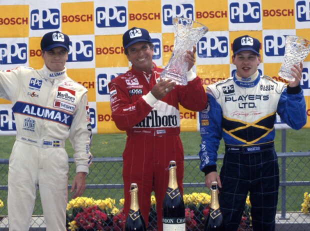 CART-Podium in Nazareth 1995: 1. Emerson Fittipaldi, 2. Jacques Villeneuve, 3. Stefan Johansson