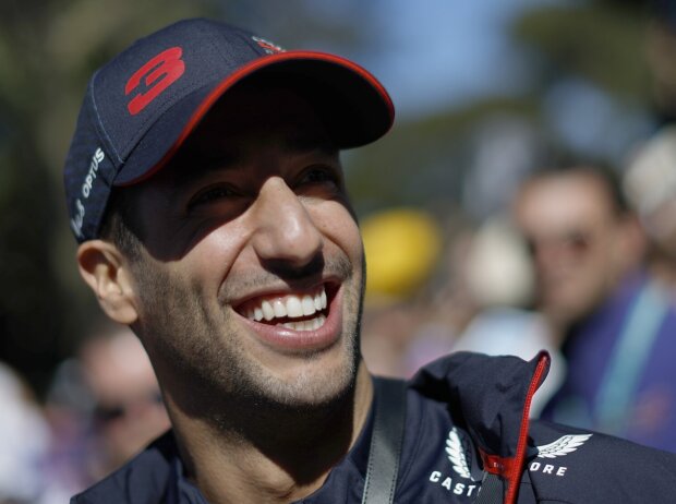 Titel-Bild zur News: Daniel Ricciardo mit seinem markanten Grinsen beim Formel-1-Rennen in Australien 2023