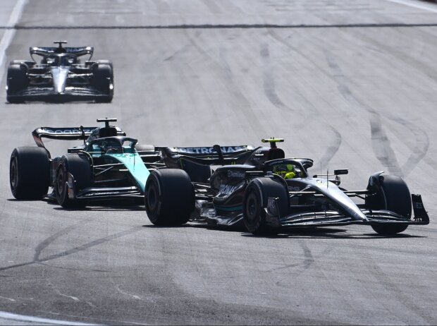 Titel-Bild zur News: Lewis Hamilton, Lance Stroll und George Russell beim Formel-1-Rennen in Baku