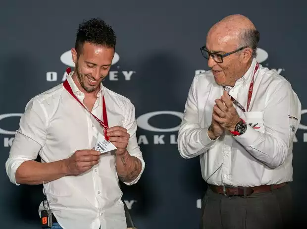 Andrea Dovizioso, Carmelo Ezpeleta Titel-Bild zur News: Andrea Dovizioso, Carmelo Ezpeleta
