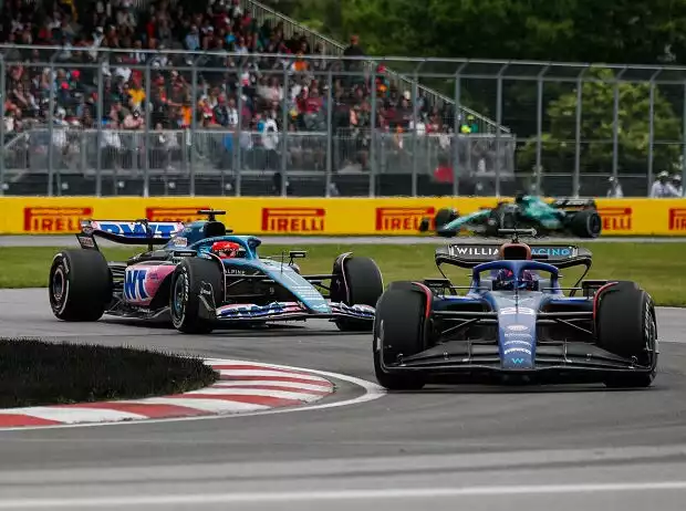 Titel-Bild zur News: Alexander Albon (Williams FW45) vor Esteban Ocon (Alpine A523) beim Formel-1-Rennen in Kanada 2023