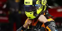 Lando Norris zieht seinen Formel-1-Fahrerhelm an in Österreich 2023