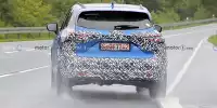 Bild zum Inhalt: Nissan Qashqai (2024) mit getarnter Facelift-Front erwischt