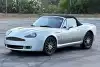 Bild zum Inhalt: Mazda MX-5 (1993) mit Bodykit im Aston Martin-Stil: Au Backe!