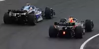 Pierre Gasly im Alpine A523 neben Max Verstappen im Red Bull RB19 beim Formel-1-Rennen in Zandvoort 2023