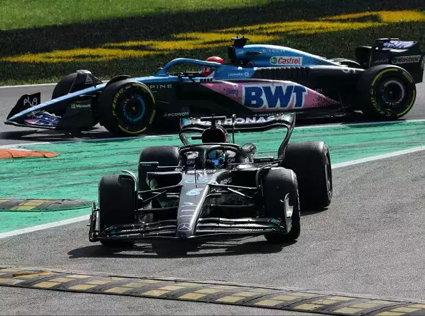 George Russell (Mercedes) und Esteban Ocon (Alpine) beim Formel-1-Rennen in Monza 2023 Titel-Bild zur News: George Russell (Mercedes) und Esteban Ocon (Alpine) beim Formel-1-Rennen in Monza 2023