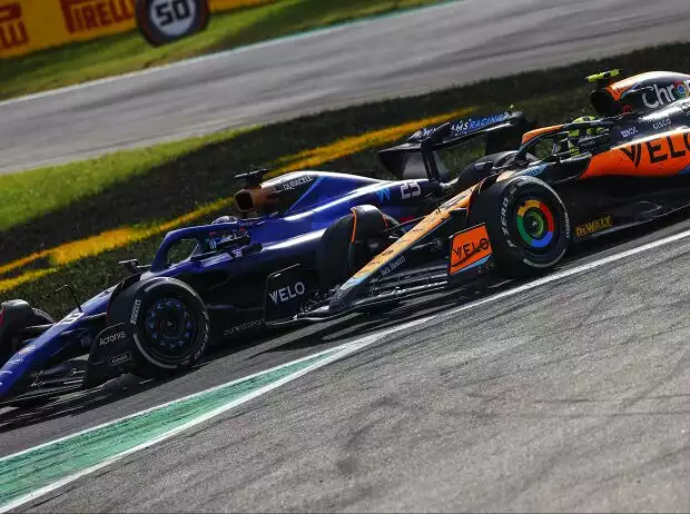 Titel-Bild zur News: Alexander Albon (Williams FW45) und Lando Norris (McLaren MCL60) beim Formel-1-Rennen in Italien 2023