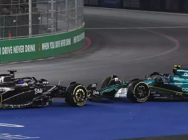 Valtteri Bottas im Alfa Romeo C43 und Fernando Alonso im Aston Martin AMR23 in Kurve 1 von Las Vegas 2023 Titel-Bild zur News: Valtteri Bottas im Alfa Romeo C43 und Fernando Alonso im Aston Martin AMR23 in Kurve 1 von Las Vegas 2023