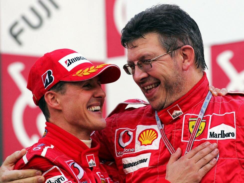 Michael Schumacher und Ross Brawn auf dem Formel-1-Podium in Suzuka